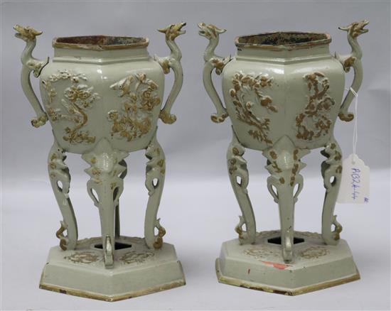 A pair of cast iron chinoiserie vases